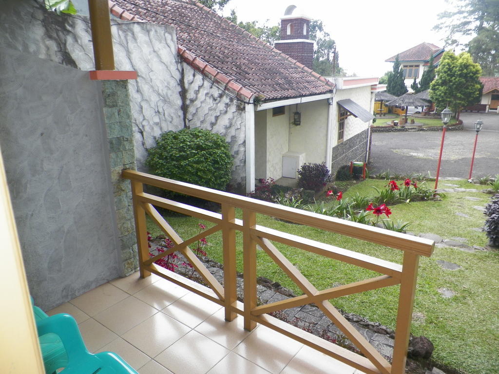 Hotel Puspa Sari Redpartner Киатер Стая снимка